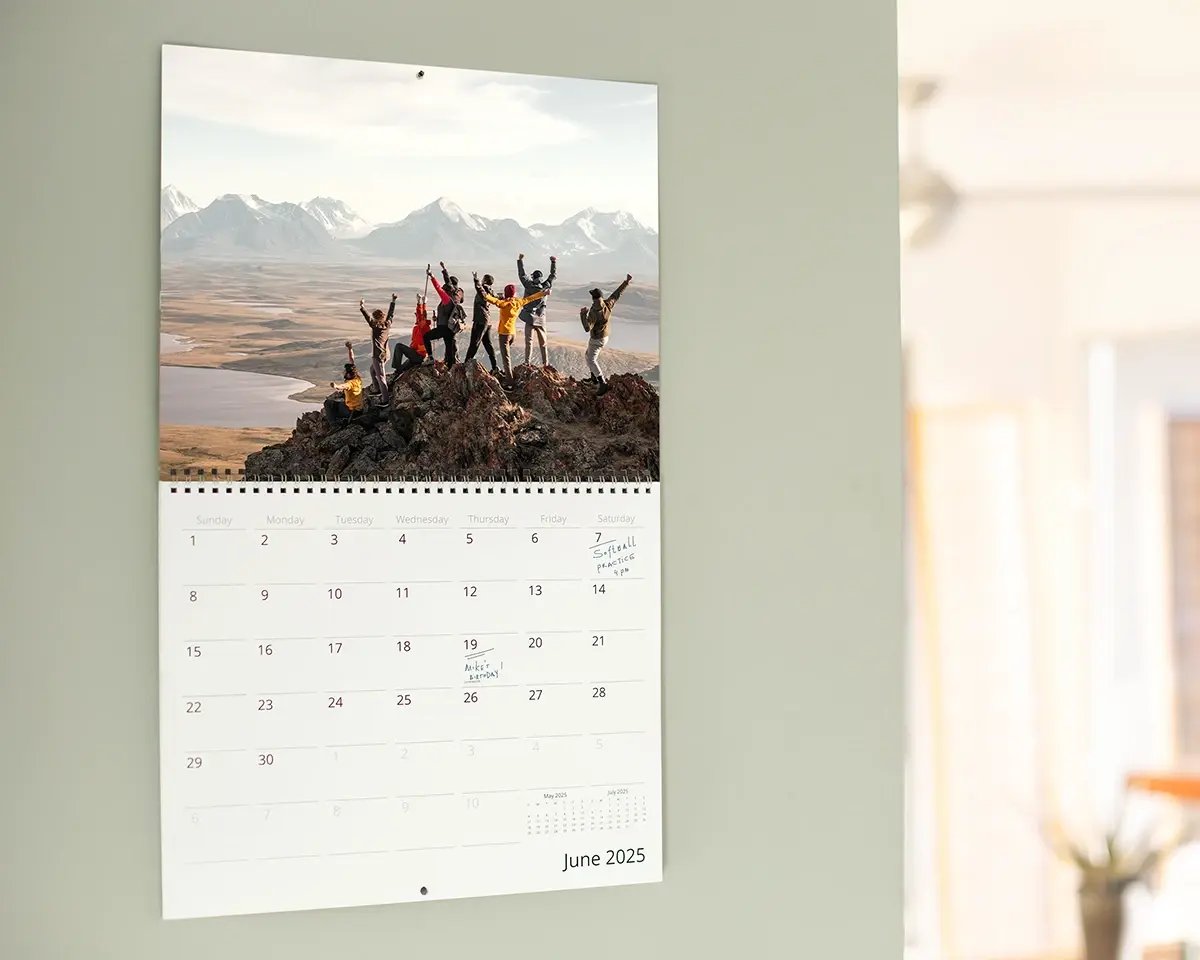 A customizable 12-month calendar filled with travel memories with friends