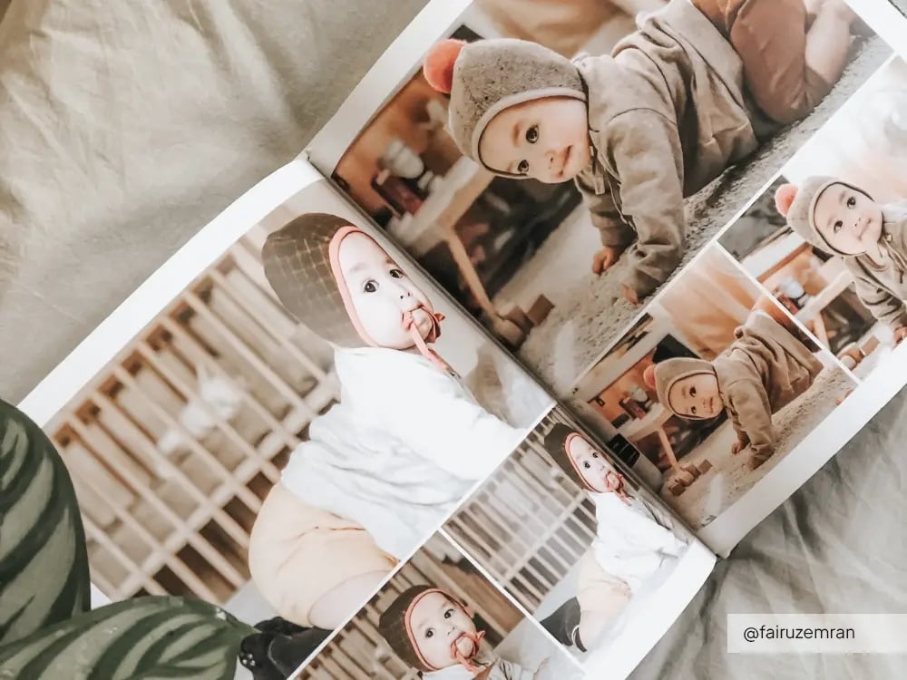 A custom hardcover photobook, beautifully crafted with high-quality and customizable spreads, featuring baby photos and special moments