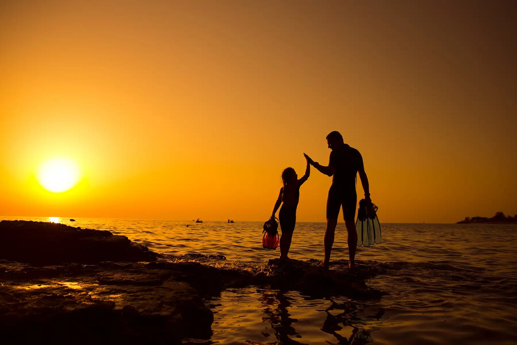 Sunsets at the beach make the perfect backdrop for photos