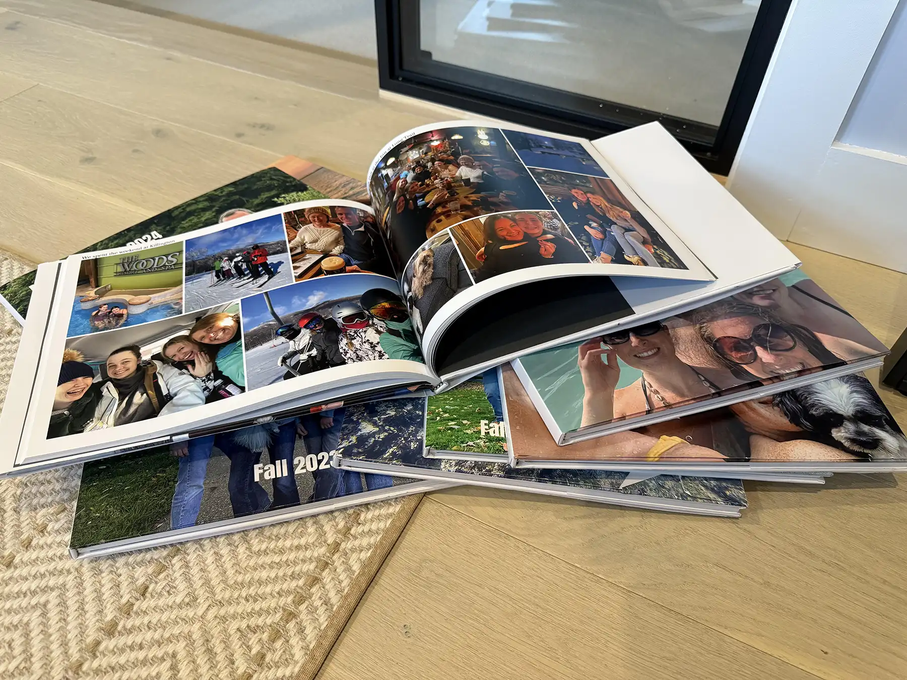 Stack of personal photo books Colleen Grazioso created using Mimeo Photos.