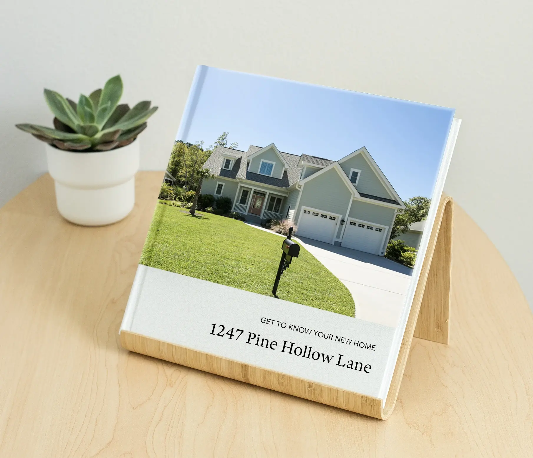 A custom photo book is a great gift from a Realtor to their client