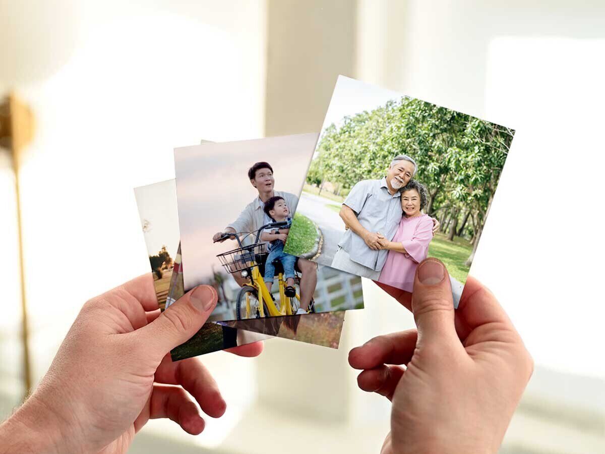 Photos being gathered for a family reunion photo book