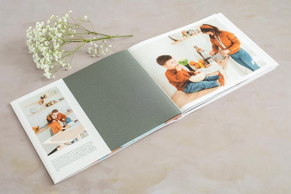 Open hardcover photo book showing a Mother's Day book dust jacket.