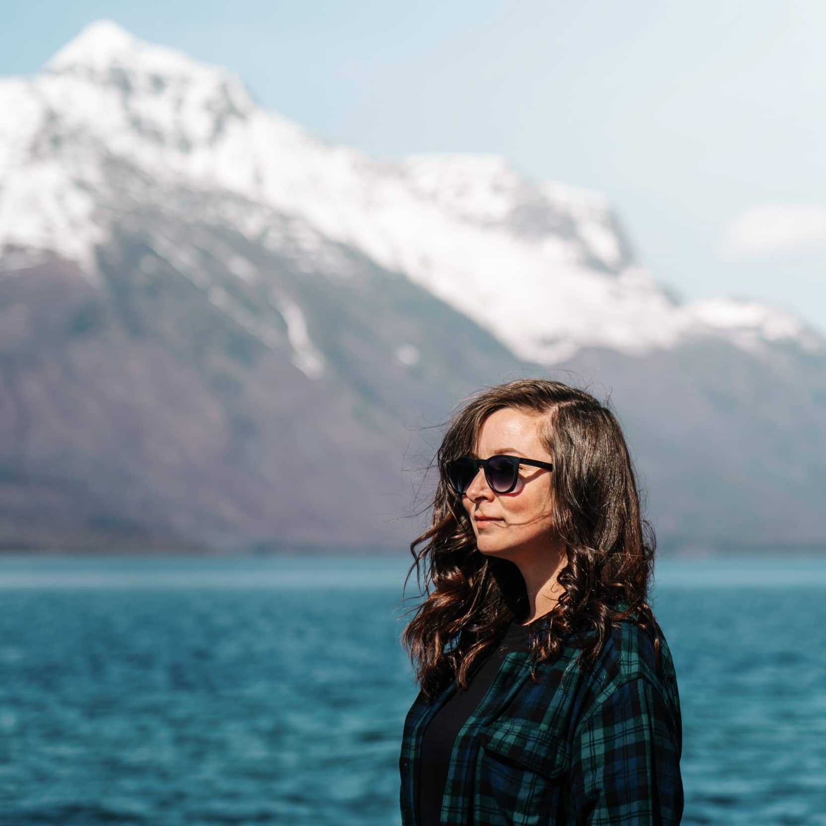 girl with mountain and lake backdrop